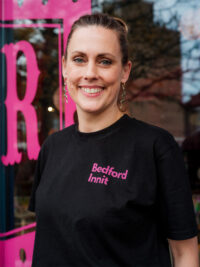 Bedford Innit Black Tee with Pink Print